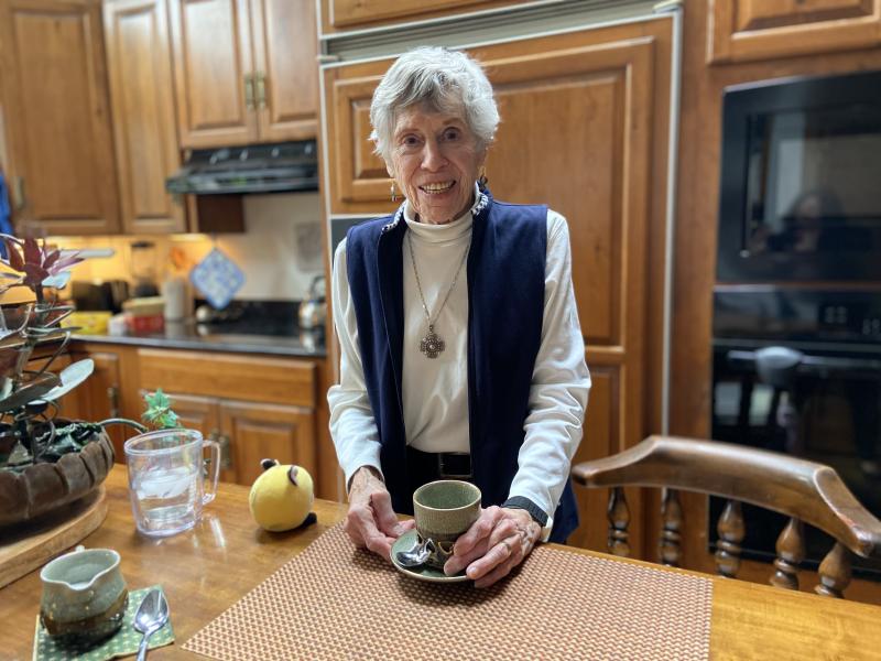 Petterson enjoys a cup of tea in her warm and inviting kitchen.